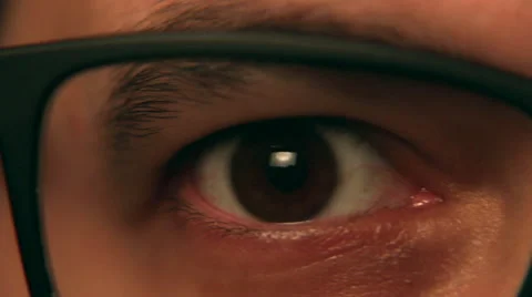 Eye Closeup with Glasses Tracking Shot - Right to Left Vidéo 57285129