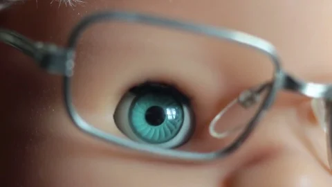 Eye doll looking at camera Stock Footage 77697967