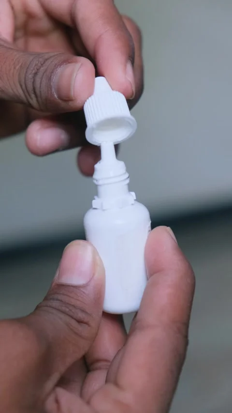 Eye Drop Bottle Cap Opening Close Up Stock Footage 332655705