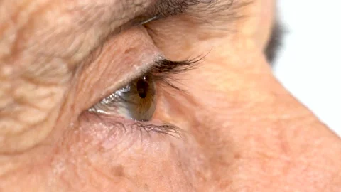 The eye of an elderly man, close up Stock Footage 141654989