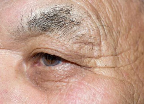 Eye of an elderly man Stock Photos