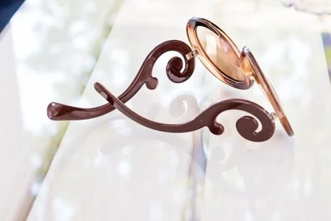 Eye fashioned glasses on glass table Stock Photos