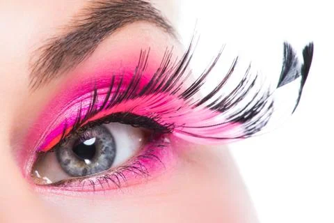 Eye with feather false eyelashes Stock Photos