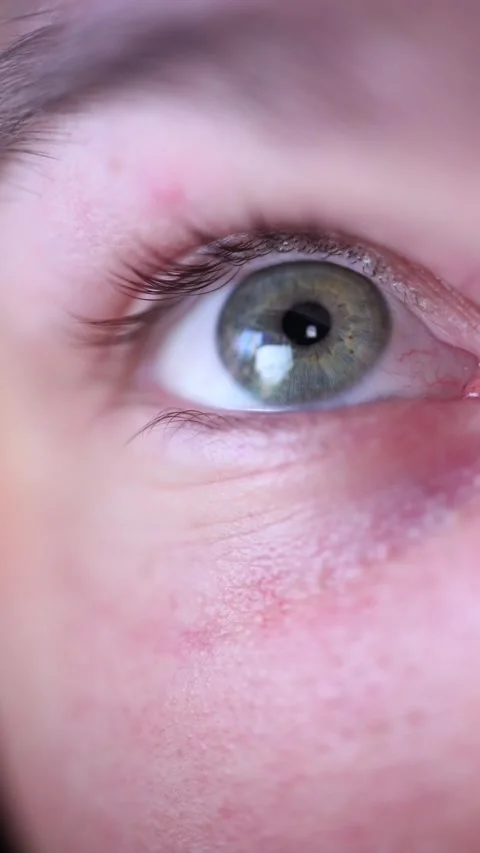 Eye focused on screen Video stock 330589091
