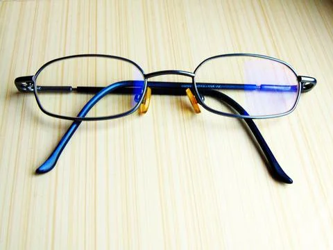 Eye glass on a table Stock-Fotos