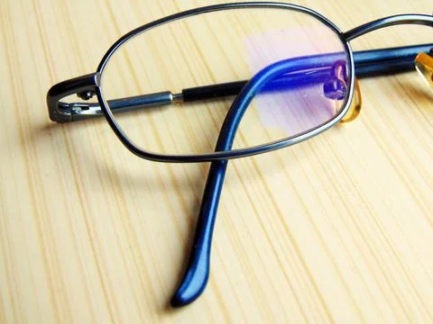 Eye glass on a table Photos