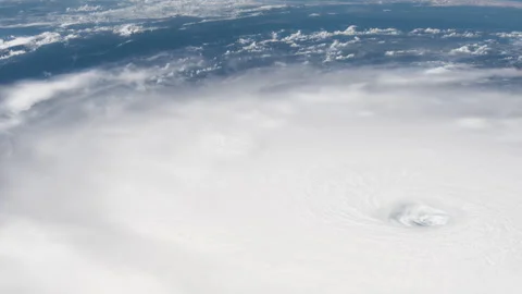 The eye of Hurricane Irma is clearly visible from the International Space statio Video stock 240971064