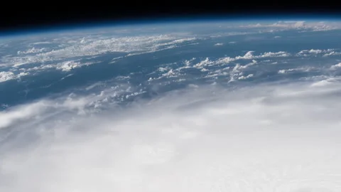 The eye of Hurricane Irma is clearly visible from the ISS slow zoom out Stock Footage 240971132