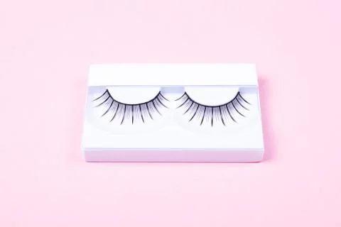 Eye lashes on pink background. Stock-Fotos