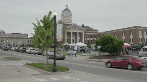 Eye Level Establishing Shot Of A Community At A Local Farmer's Market. 4K Stock Footage 152646925