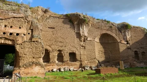 Eye level massive sunlit brick ruins baths caracalla exposed core arched Stock Footage 324760308
