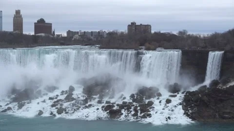 Eye-level shot of American Falls at Niagara Falls. Features cascading water Stock Footage 336438228