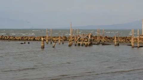 Eye level shot on the kartini beach, rembang, central java on September Stock Footage 214639497