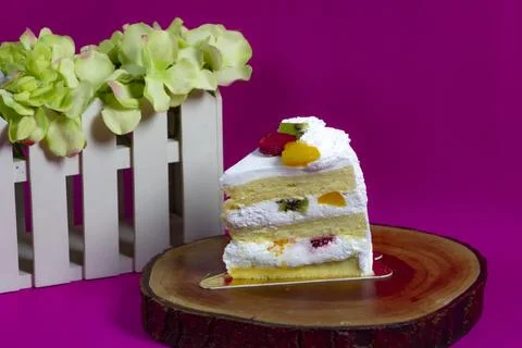Eye level view of sliced fruit cake Stock Photos