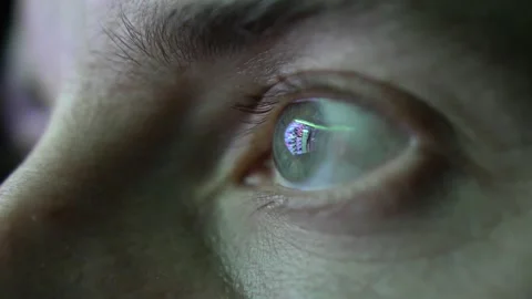 Eye Looking at Computer Screen Programming Hacker Code Reflecting in Eyeball Video stock 147962607