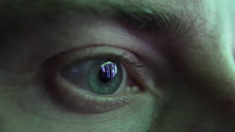 Eye Looking at Computer Screen Programming Hacker Code Reflecting in Eyeball Stock Footage 147962809