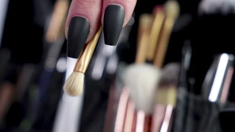 Eye make up brush picked up by artist. Stock Footage 308035623