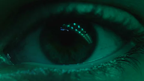 Eye of man driving through night city, flashing lights reflection, close up Stock-Footage 100939824