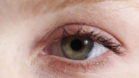 Eye, opening and optometry with person at clinic for healthcare appointment or Video stock 336673344