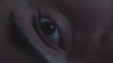 Eye opening in slow motion Stock Footage 64371732