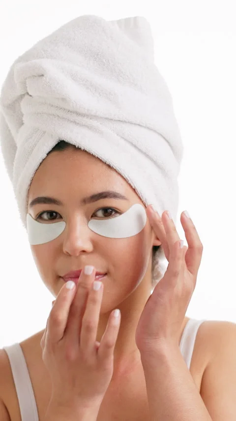 Eye patch, beauty and face with woman in studio for self care, cosmetics or 스톡 동영상 333703350
