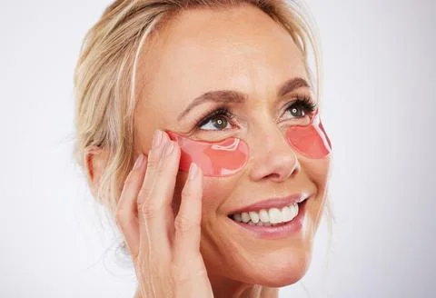 Eye patch, face and dermatology with woman and smile, beauty and skincare with Fotos de archivo