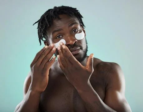 Eye patch, man and face portrait for skincare, beauty and dermatology in studio Stock Photos