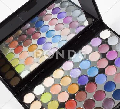 Eye shadows palette reflected in the mirror Stock Photos
