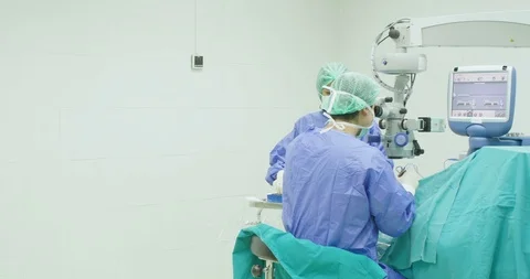 Eye surgeon with microscope Video stock 90854589