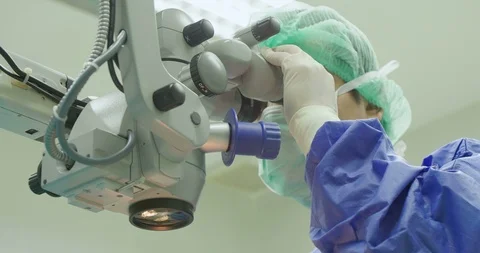 Eye surgeon with microscope Video stock 90859080