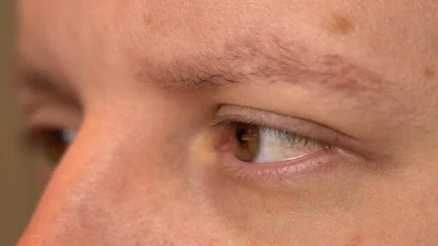 Eye of a tired man looking at the screen. Reflection in the eyes of the screen Stock Footage 156240144