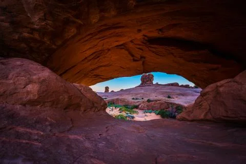 Eye of the Whale from the inside out after Sunset Arches National Park Stock Photos