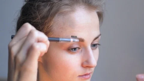 Eyebrow combing close up Video stock 71590002