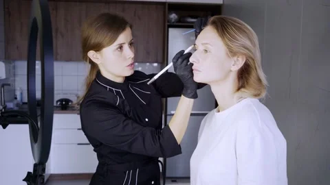 Eyebrow correction process Stock Footage 168283810