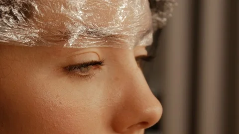 Eyebrow lamination procedure close up Stock Footage 108001925