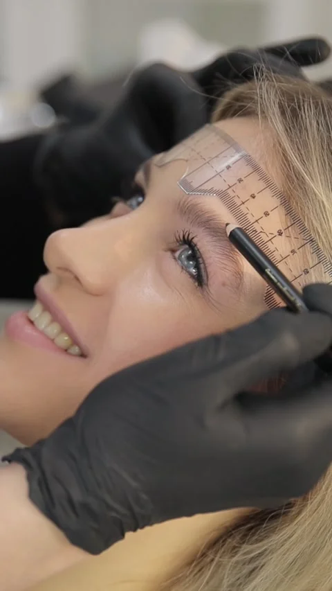 The Eyebrow Microblading Procedure is Actively Underway for a New Clients Stock Footage 304826636