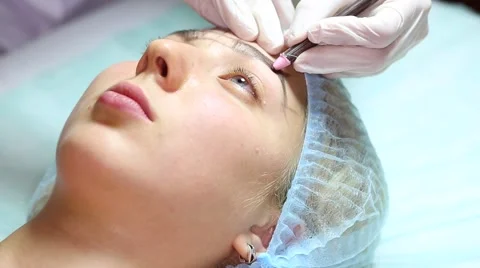 Eyebrow Microblading procedure, close up Stock Footage 65310616