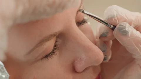 Eyebrow microblading process, Precise cosmetic procedure for perfect eyebrows Video stock 327482086