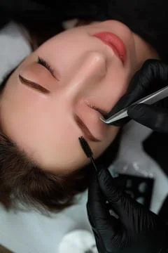 Eyebrow permanent makeup procedure Stock Photos