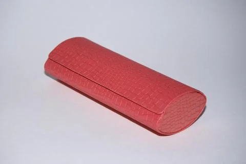 Eyeglass case. brown color, rectangular shape with a shaped lid. On an isolated  Stock Photos