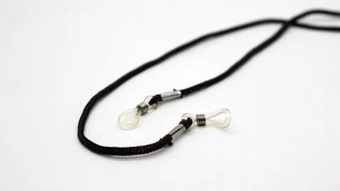 The eyeglass strap is black Stock Photos