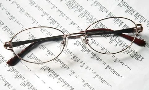 Eyeglasses on account document Stock-Fotos