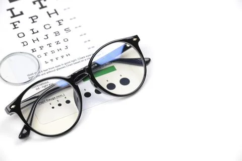 Eyeglasses on blur chart Stock-Fotos
