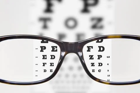 Eyeglasses during optometric examination 스톡 사진