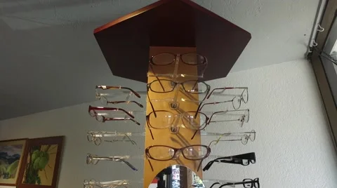 Eyeglasses on rack Stock Footage 60753948