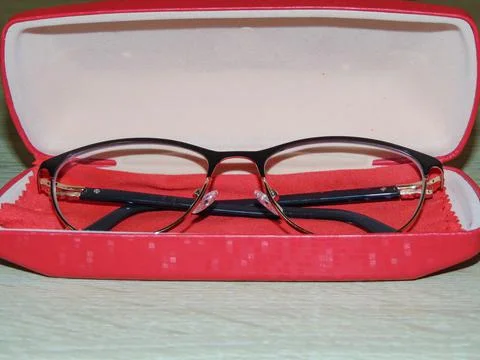 Eyeglasses in a red case. Glasses case Photos