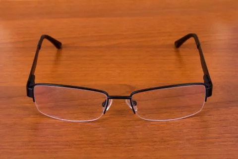 Eyeglasses on table Stock Photos