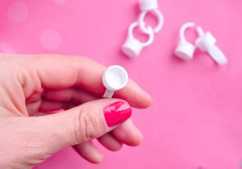 Eyelash Extension Ring Holder For drop of glue on finger Stock Photos