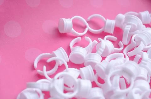 Eyelash Extension Ring Holder For drop of glue on finger Stock Photos
