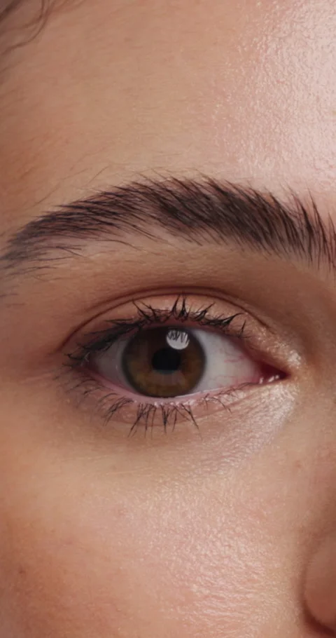 Eyelashes, face and eye color of woman with mascara, cosmetics and eyebrow Stock Footage 335932592